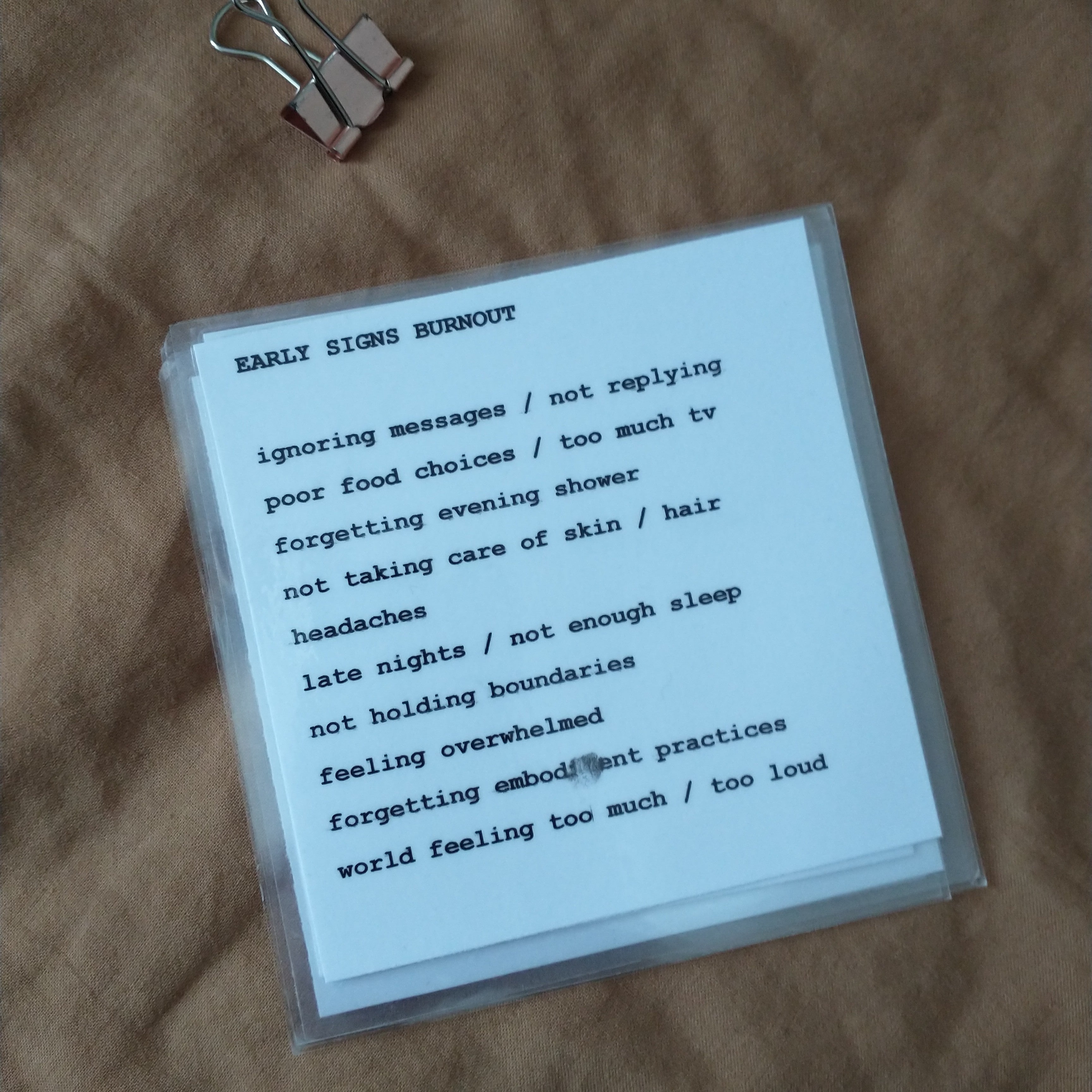 DIY self care prompt cards with typewriter style text show list of "Early Signs of Burnout"